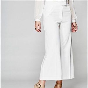 White wide leg cropped pants by Marciano.